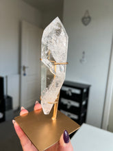 Load image into Gallery viewer, Polished Lemurian Point On Custom Gold Stand
